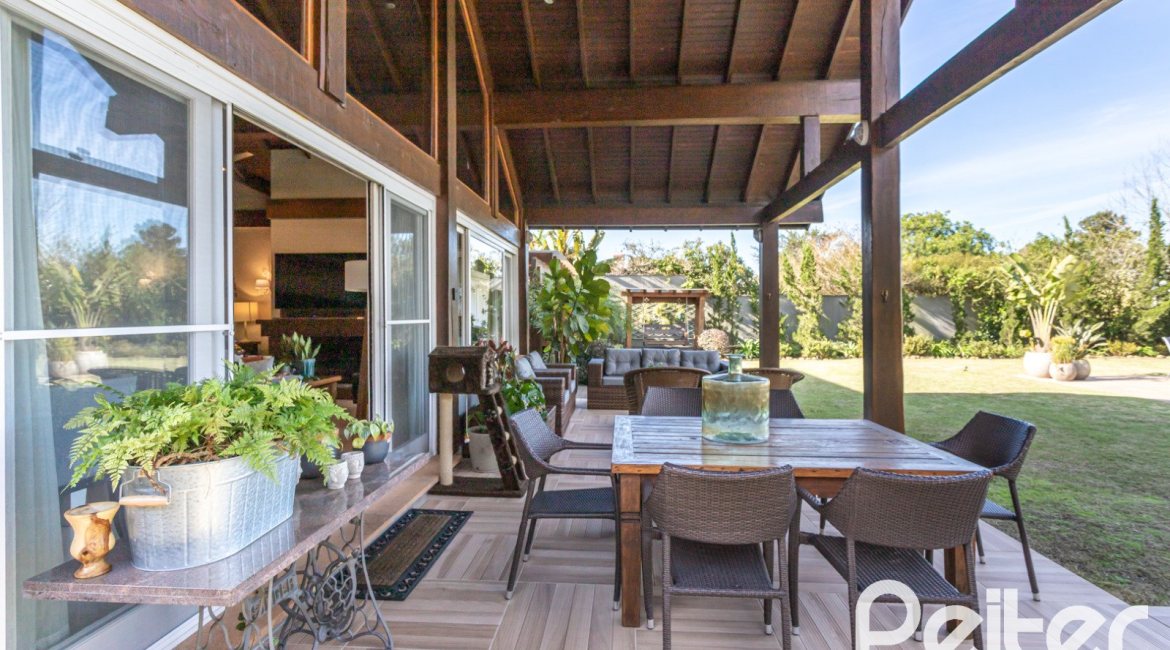 Casa em Condomínio à venda com 366m², 4 dormitórios, 4 suítes, 3 vagas, no bairro Terra Ville em PORTO ALEGRE