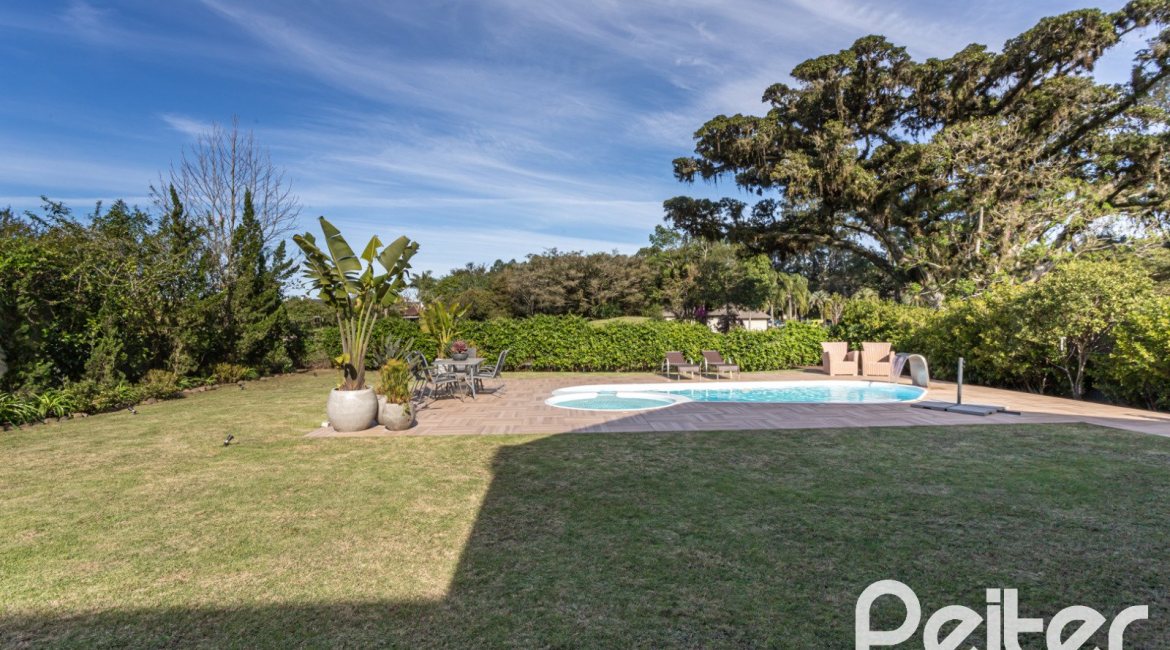 Casa em Condomínio à venda com 366m², 4 dormitórios, 4 suítes, 3 vagas, no bairro Terra Ville em PORTO ALEGRE