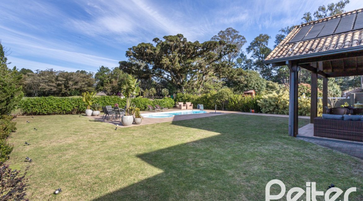 Casa em Condomínio à venda com 366m², 4 dormitórios, 4 suítes, 3 vagas, no bairro Terra Ville em PORTO ALEGRE