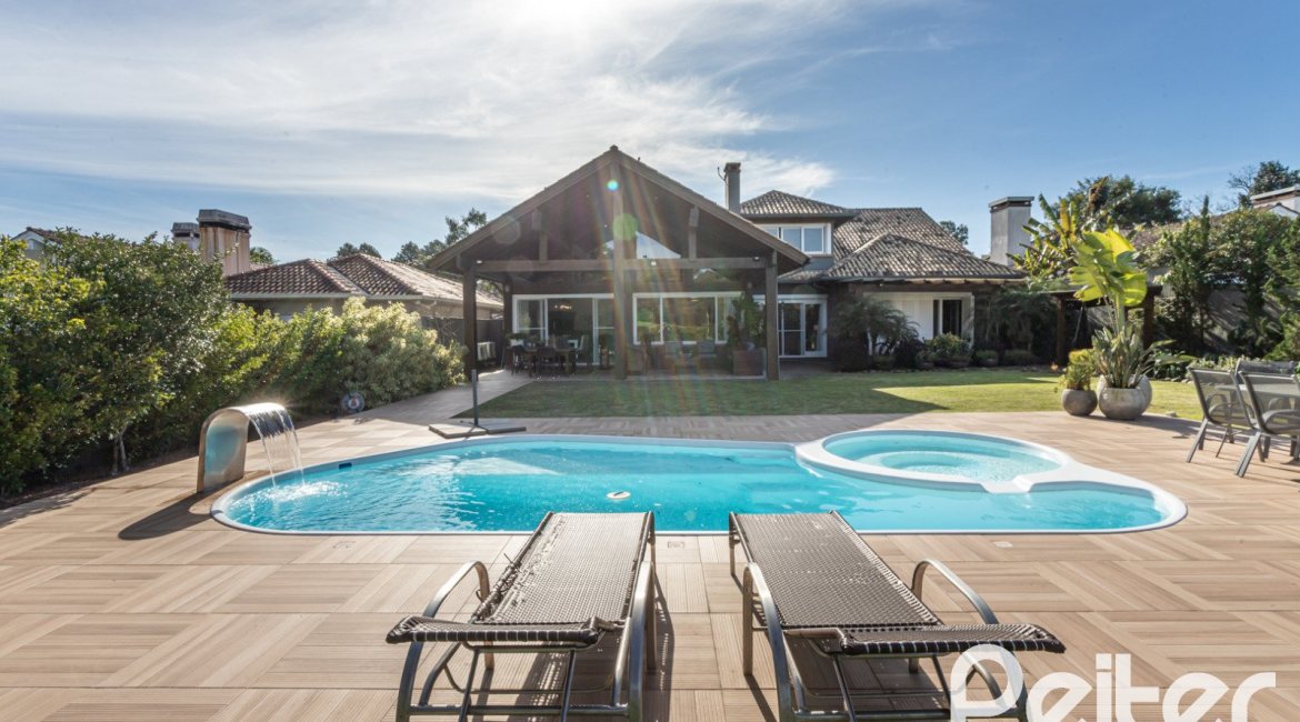 Casa em Condomínio à venda com 366m², 4 dormitórios, 4 suítes, 3 vagas, no bairro Terra Ville em PORTO ALEGRE