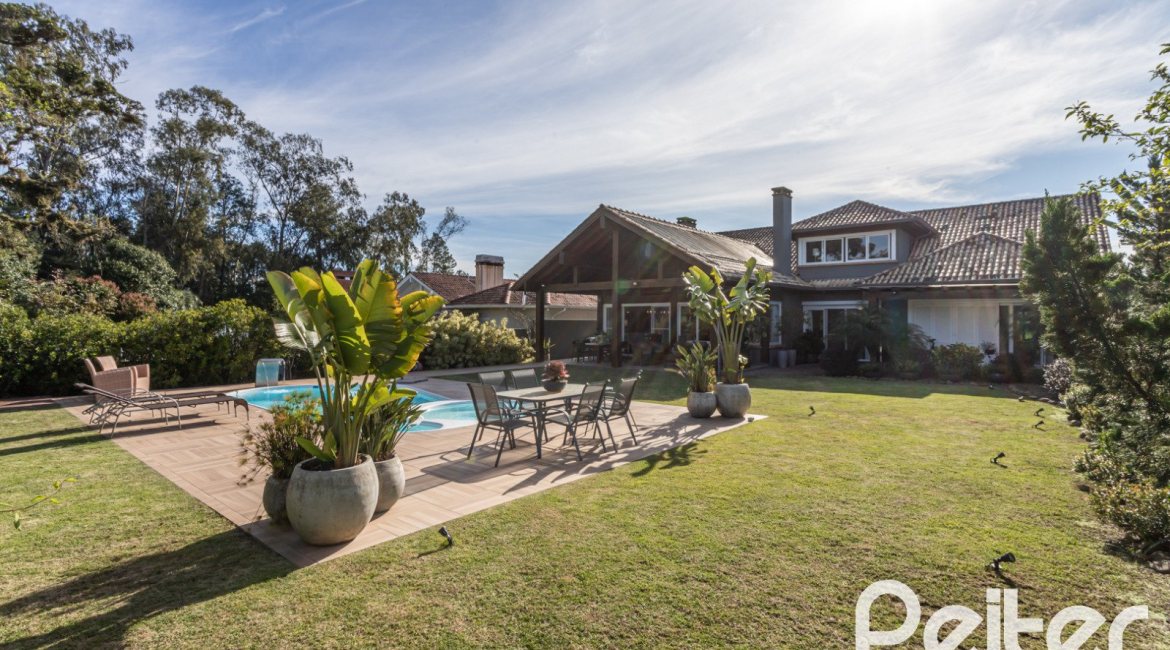 Casa em Condomínio à venda com 366m², 4 dormitórios, 4 suítes, 3 vagas, no bairro Terra Ville em PORTO ALEGRE