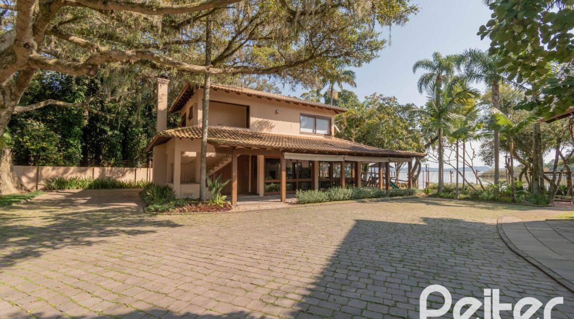 Casa em Condomínio à venda com 327m², 3 dormitórios, 3 suítes, 3 vagas, no bairro Tristeza em PORTO ALEGRE