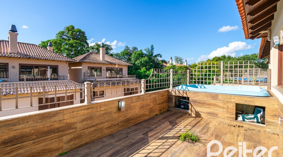 Casa em Condomínio à venda com 327m², 3 dormitórios, 3 suítes, 3 vagas, no bairro Tristeza em PORTO ALEGRE