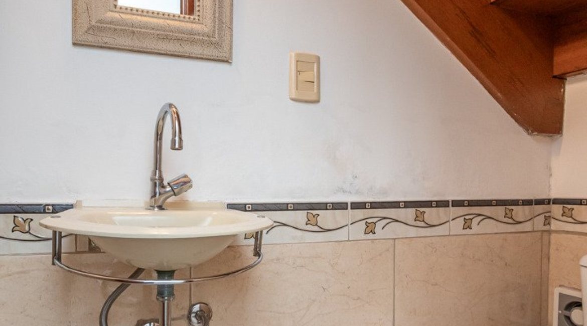 Casa em Condomínio à venda com 186m², 3 dormitórios, 1 suíte, 2 vagas, no bairro Jardim Isabel em Porto Alegre