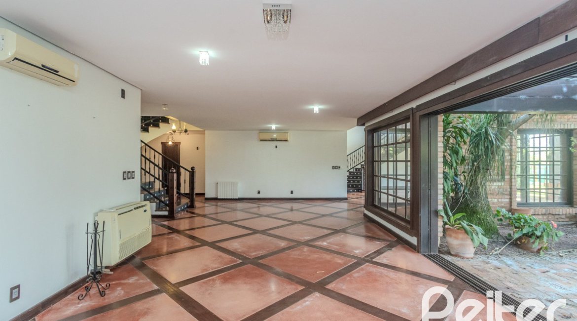 Casa em Condomínio à venda com 493m², 5 dormitórios, 5 suítes, 4 vagas, no bairro Terra Ville em Porto Alegre