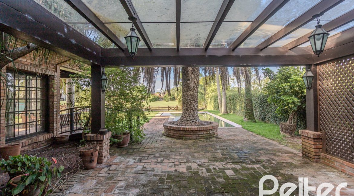 Casa em Condomínio à venda com 493m², 5 dormitórios, 5 suítes, 4 vagas, no bairro Terra Ville em Porto Alegre