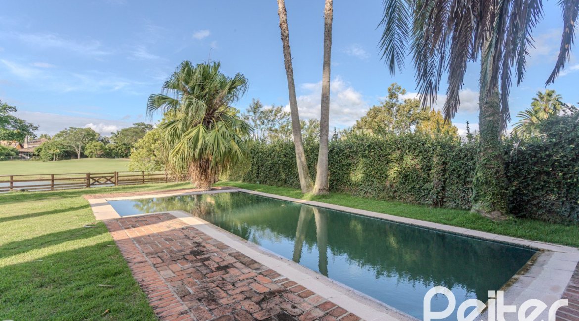 Casa em Condomínio à venda com 493m², 5 dormitórios, 5 suítes, 4 vagas, no bairro Terra Ville em Porto Alegre