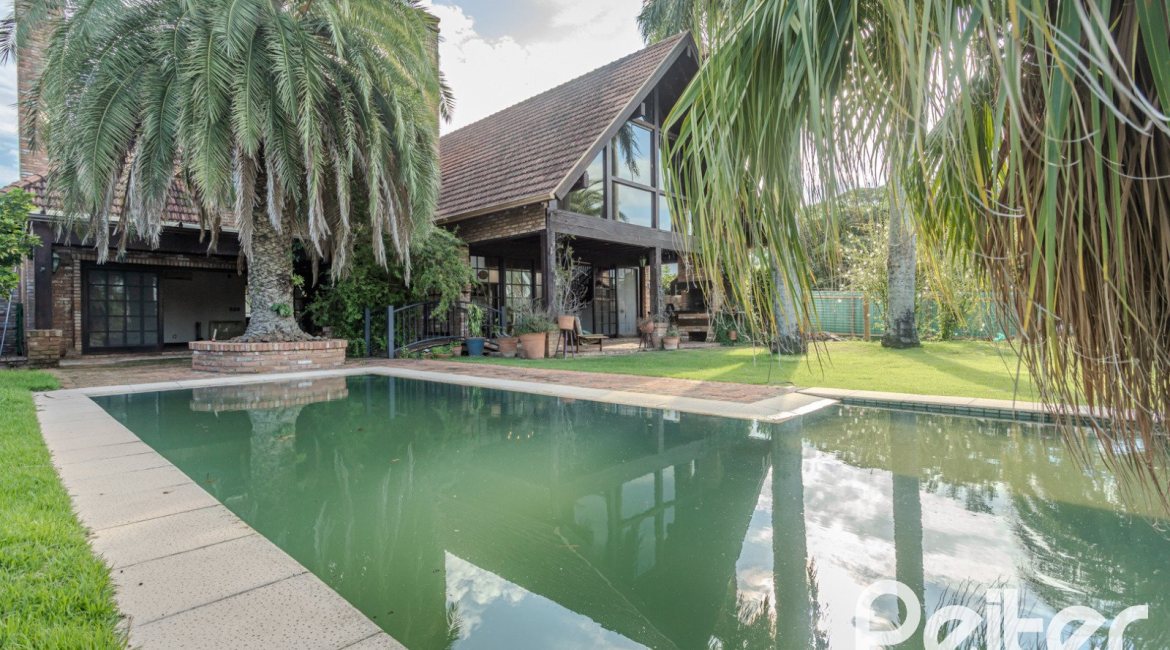 Casa em Condomínio à venda com 493m², 5 dormitórios, 5 suítes, 4 vagas, no bairro Terra Ville em Porto Alegre