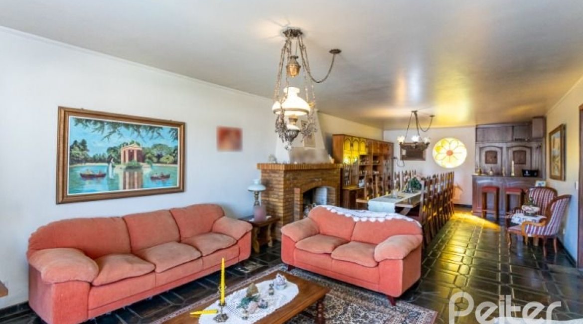 Casa à venda com 564m², 5 dormitórios, 2 suítes, 4 vagas, no bairro Vila Assunção em Porto Alegre