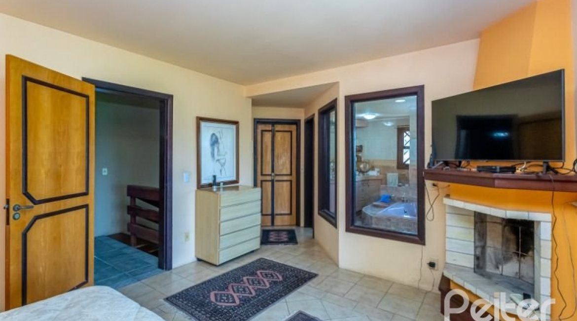 Casa à venda com 600m², 4 dormitórios, 4 suítes, 4 vagas, no bairro Vila Conceição em Porto Alegre