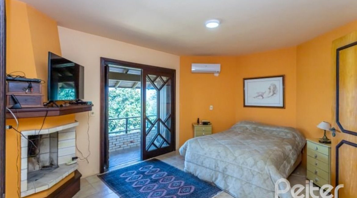 Casa à venda com 600m², 4 dormitórios, 4 suítes, 4 vagas, no bairro Vila Conceição em Porto Alegre