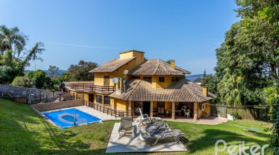 Casa à venda com 600m², 4 dormitórios, 4 suítes, 4 vagas, no bairro Vila Conceição em Porto Alegre