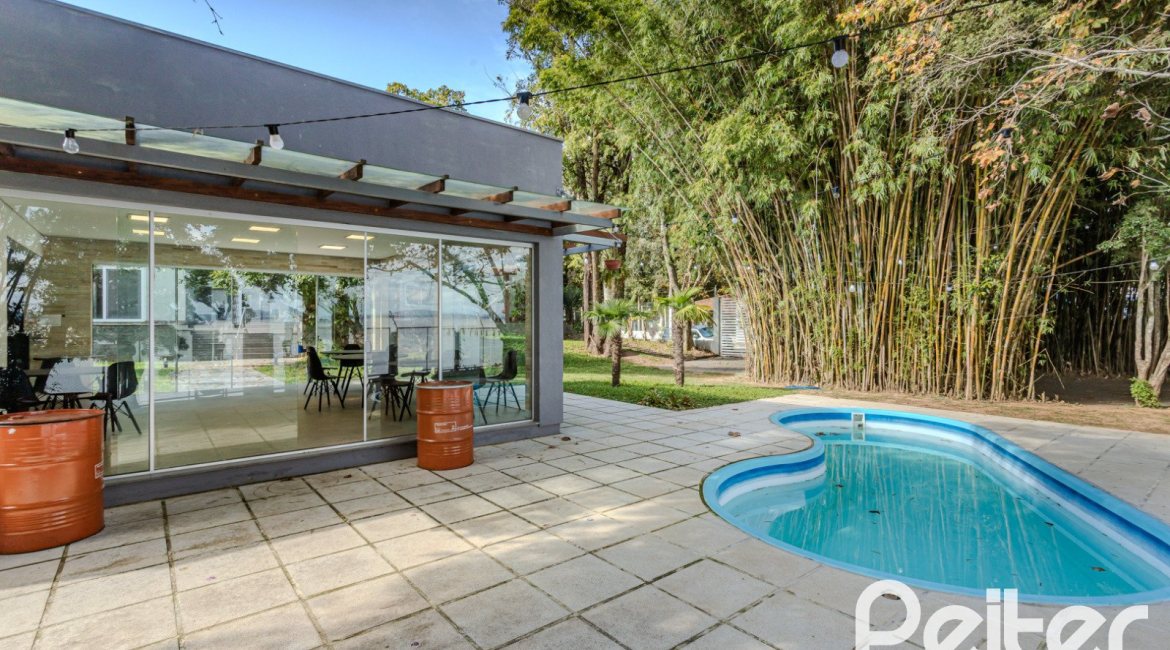 Casa em Condomínio à venda com 304m², 4 dormitórios, 4 suítes, 3 vagas, no bairro Tristeza em Porto Alegre