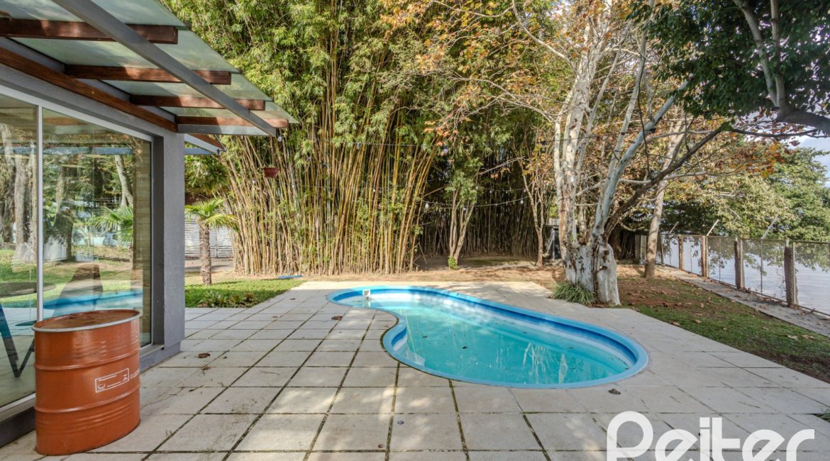 Casa em Condomínio à venda com 280m², 4 dormitórios, 4 suítes, 3 vagas, no bairro Tristeza em Porto Alegre