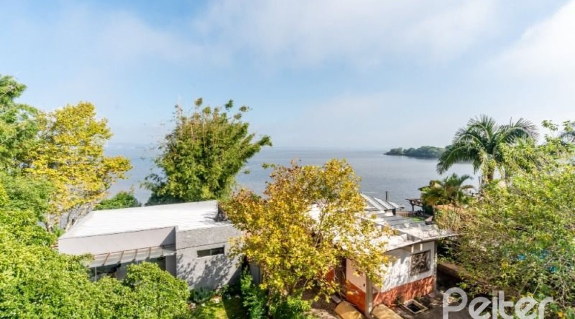 Casa em Condomínio à venda com 296m², 4 dormitórios, 2 suítes, 3 vagas, no bairro Tristeza em Porto Alegre