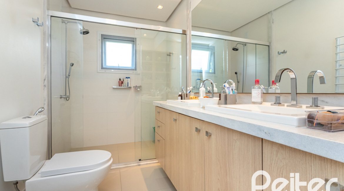 Casa em Condomínio à venda com 253m², 3 dormitórios, 3 suítes, 2 vagas, no bairro Alphaville em PORTO ALEGRE