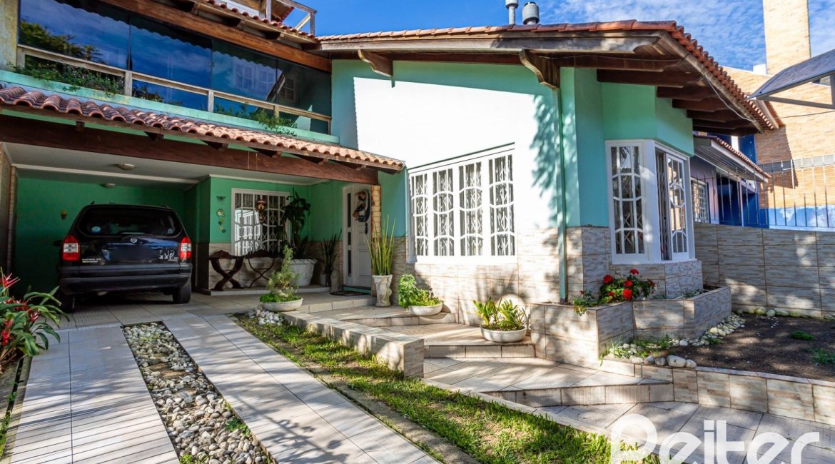 Casa à venda com 407m², 3 dormitórios, 2 suítes, 4 vagas, no bairro Ipanema em Porto Alegre