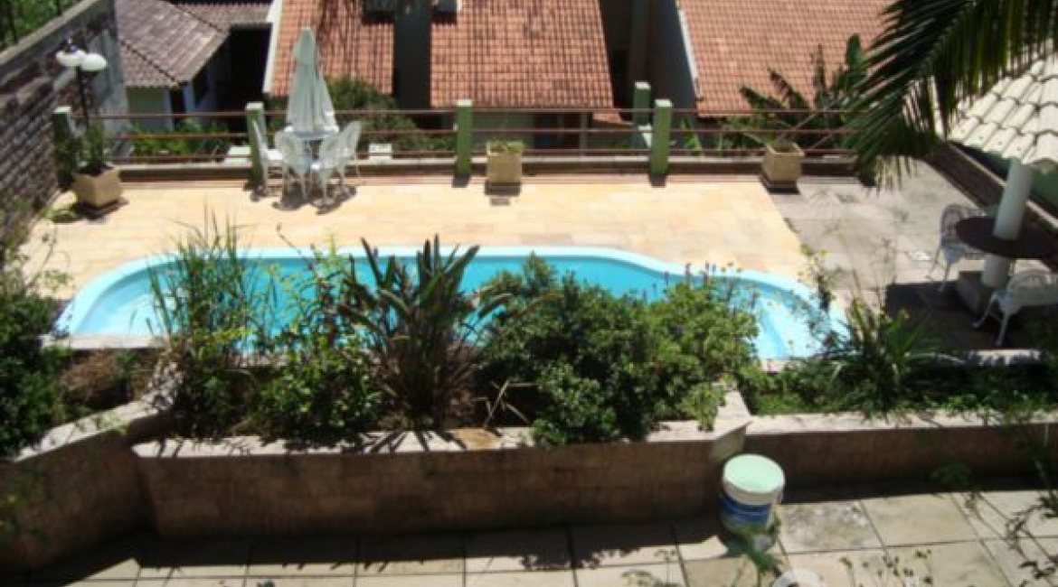 Casa em Condomínio à venda com 300m², 4 dormitórios, 1 suíte, 2 vagas, no bairro Nonoai em Porto Alegre