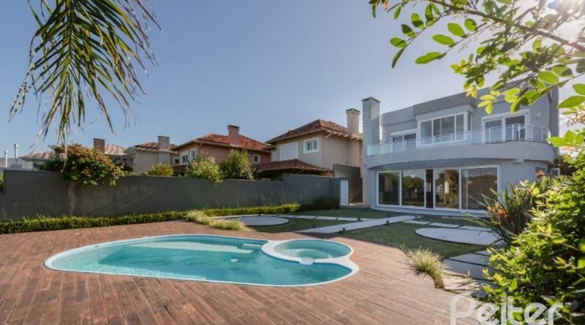Casa em Condomínio à venda com 299m², 5 dormitórios, 5 suítes, 4 vagas, no bairro Terra Ville em PORTO ALEGRE