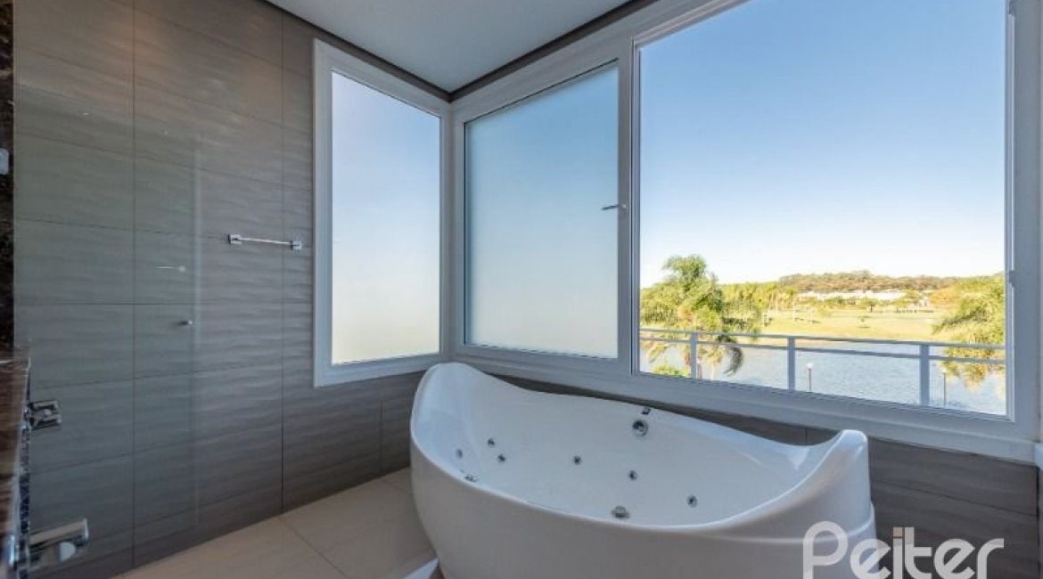 Casa em Condomínio à venda com 299m², 5 dormitórios, 5 suítes, 4 vagas, no bairro Terra Ville em PORTO ALEGRE