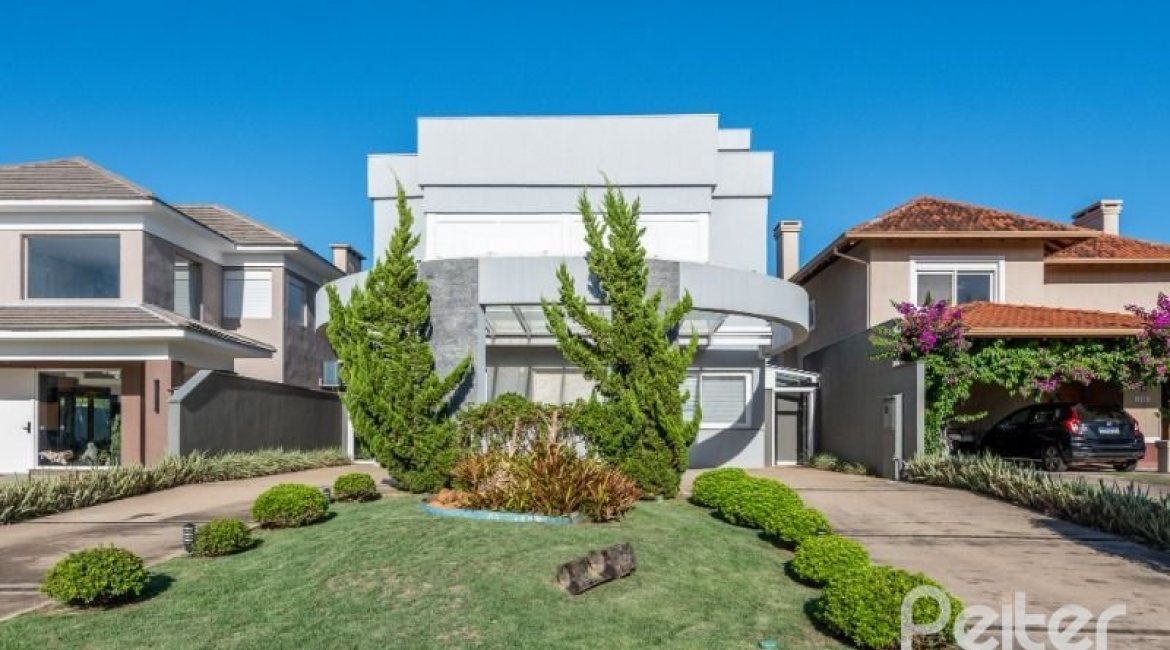 Casa em Condomínio à venda com 299m², 5 dormitórios, 5 suítes, 4 vagas, no bairro Terra Ville em PORTO ALEGRE