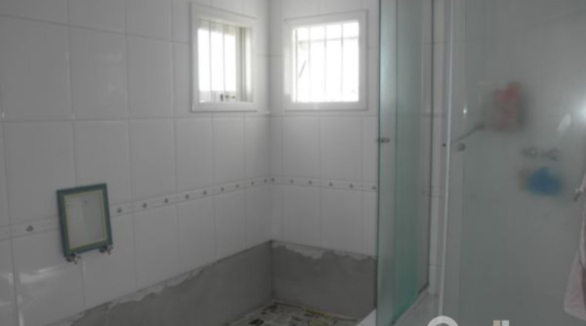 Casa à venda com 445m², 4 dormitórios, 2 suítes, 2 vagas, no bairro Ipanema em Porto Alegre