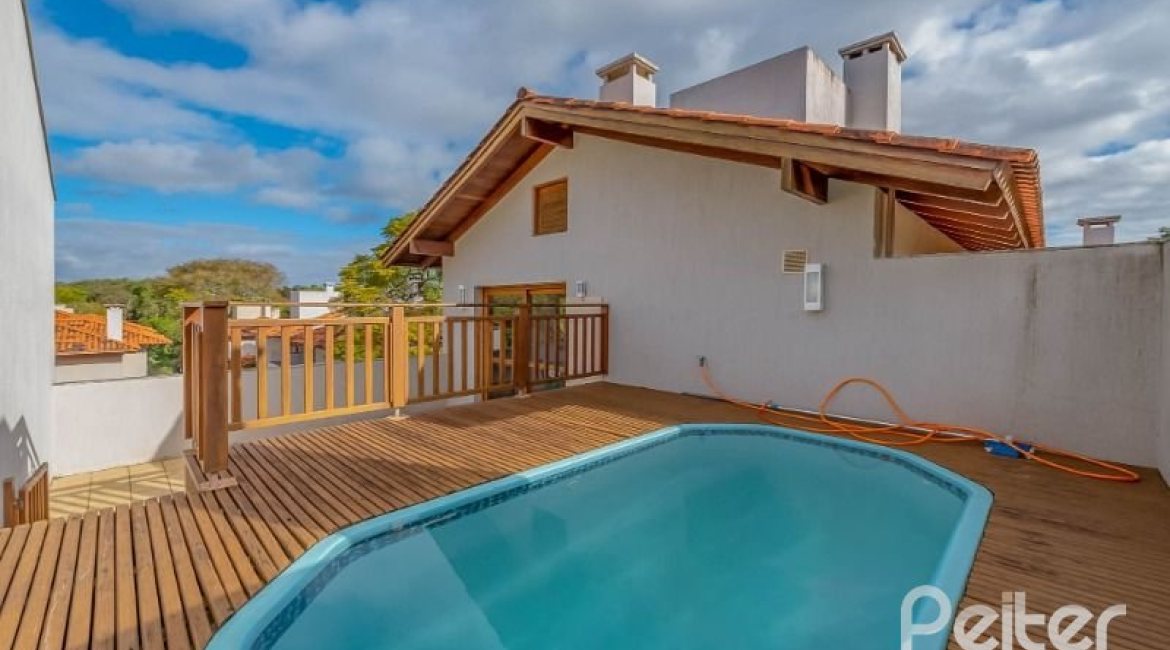 Casa em Condomínio à venda com 334m², 4 dormitórios, 1 suíte, 2 vagas, no bairro Jardim Isabel em Porto Alegre