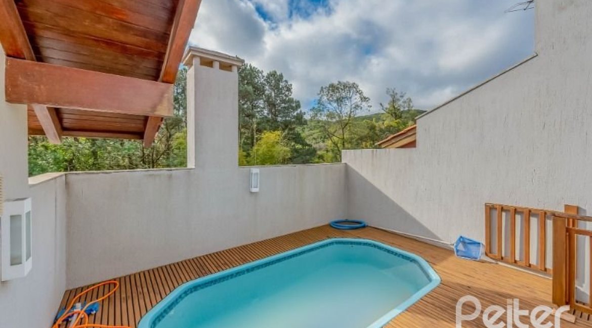 Casa em Condomínio à venda com 334m², 4 dormitórios, 1 suíte, 2 vagas, no bairro Jardim Isabel em Porto Alegre