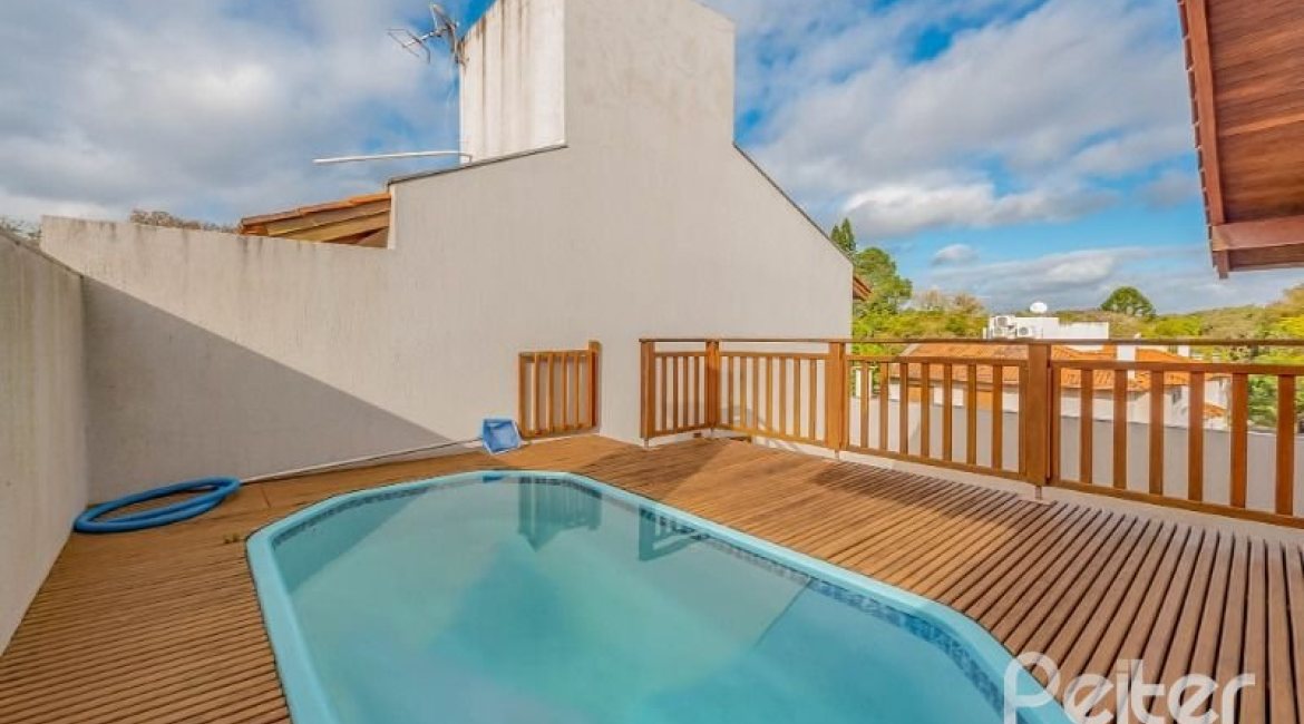 Casa em Condomínio à venda com 334m², 4 dormitórios, 1 suíte, 2 vagas, no bairro Jardim Isabel em Porto Alegre