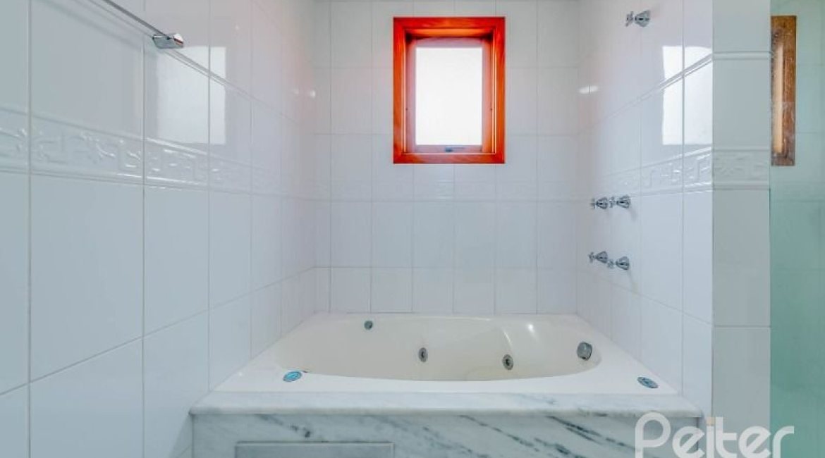 Casa em Condomínio à venda com 334m², 4 dormitórios, 1 suíte, 2 vagas, no bairro Jardim Isabel em Porto Alegre