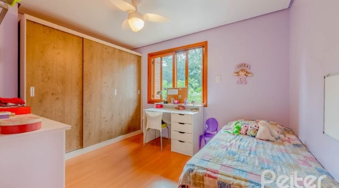 Casa em Condomínio à venda com 334m², 4 dormitórios, 1 suíte, 2 vagas, no bairro Jardim Isabel em Porto Alegre