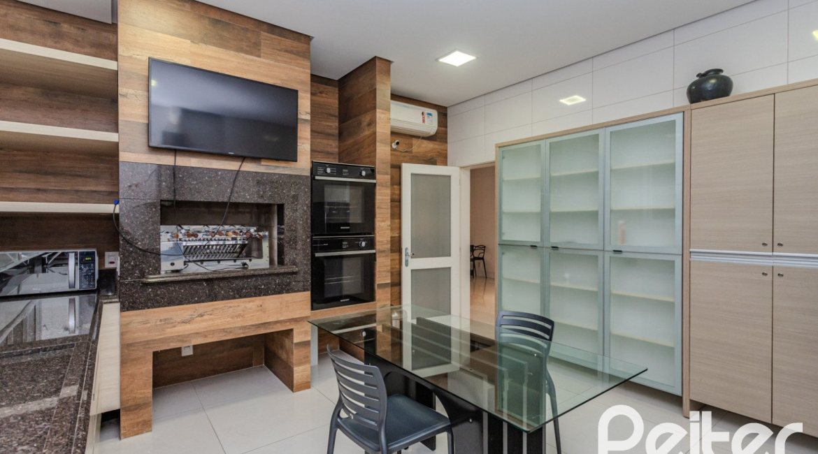 Casa em Condomínio à venda com 503m², 4 dormitórios, 4 suítes, 4 vagas, no bairro Terra Ville em PORTO ALEGRE