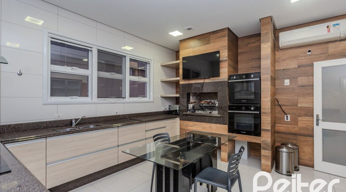 Casa em Condomínio à venda com 503m², 4 dormitórios, 4 suítes, 4 vagas, no bairro Terra Ville em PORTO ALEGRE