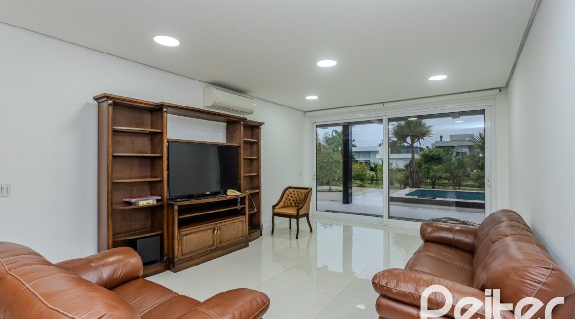Casa em Condomínio à venda com 503m², 4 dormitórios, 4 suítes, 4 vagas, no bairro Terra Ville em PORTO ALEGRE