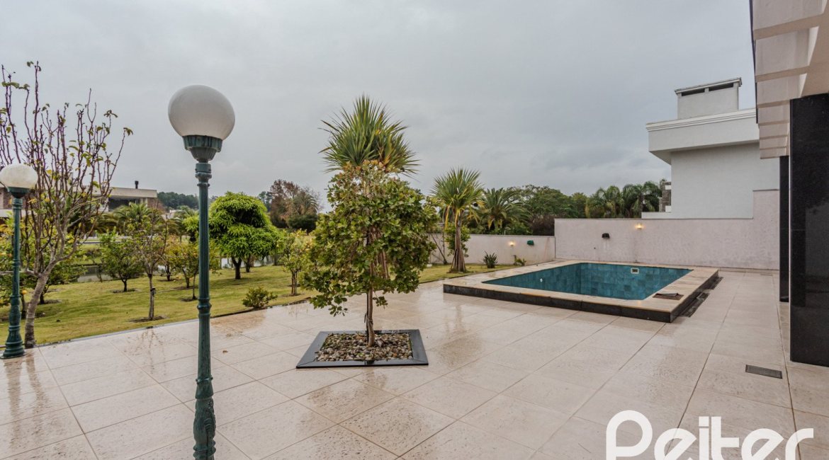 Casa em Condomínio à venda com 503m², 4 dormitórios, 4 suítes, 4 vagas, no bairro Terra Ville em PORTO ALEGRE