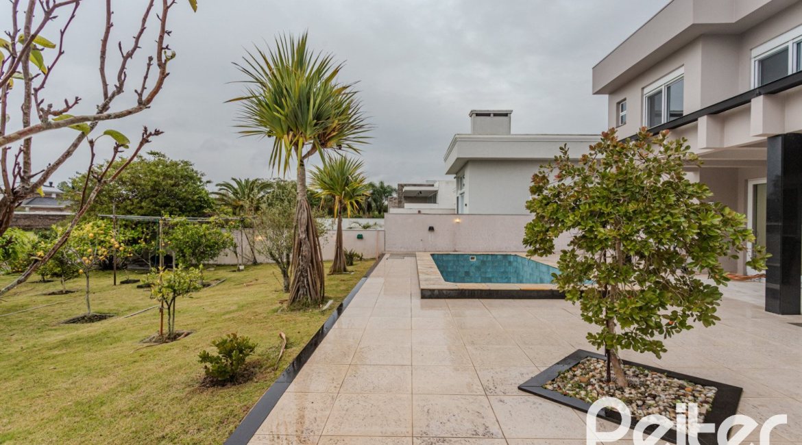 Casa em Condomínio à venda com 503m², 4 dormitórios, 4 suítes, 4 vagas, no bairro Terra Ville em PORTO ALEGRE