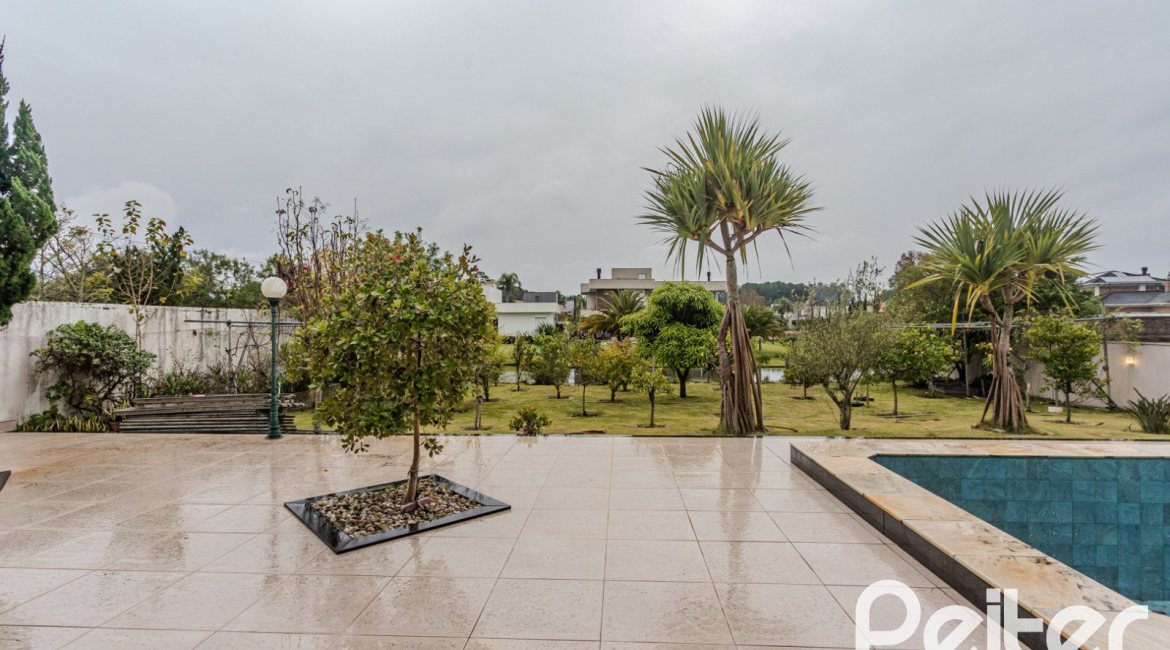 Casa em Condomínio à venda com 503m², 4 dormitórios, 4 suítes, 4 vagas, no bairro Terra Ville em PORTO ALEGRE