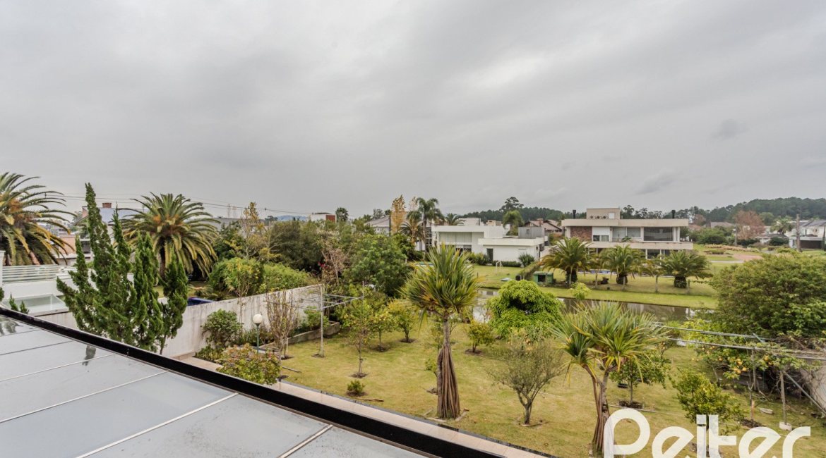 Casa em Condomínio à venda com 503m², 4 dormitórios, 4 suítes, 4 vagas, no bairro Terra Ville em PORTO ALEGRE