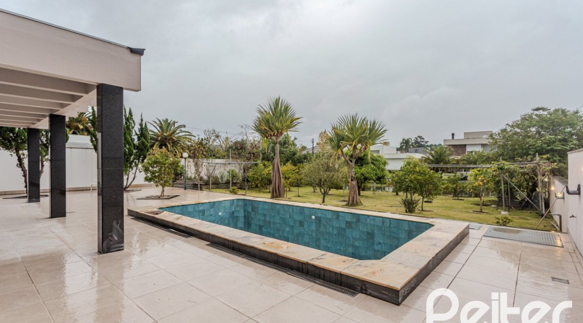 Casa em Condomínio à venda com 503m², 4 dormitórios, 4 suítes, 4 vagas, no bairro Terra Ville em PORTO ALEGRE