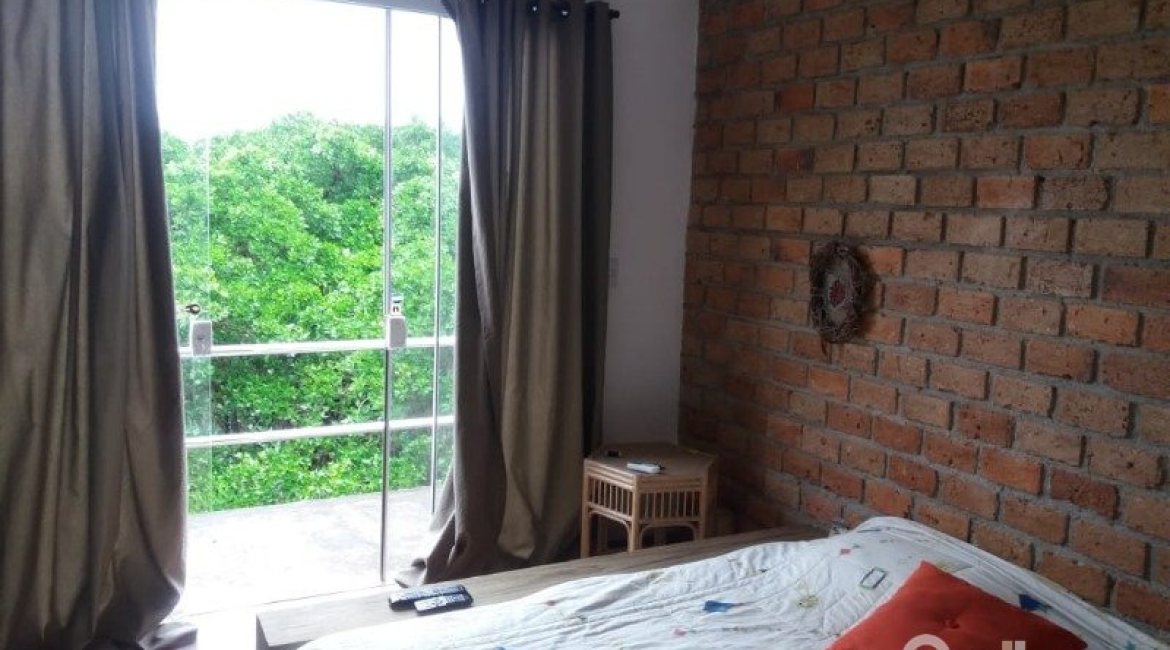 Casa à venda com 287m², 3 dormitórios, 3 suítes, 2 vagas, no bairro Ipanema em Porto Alegre