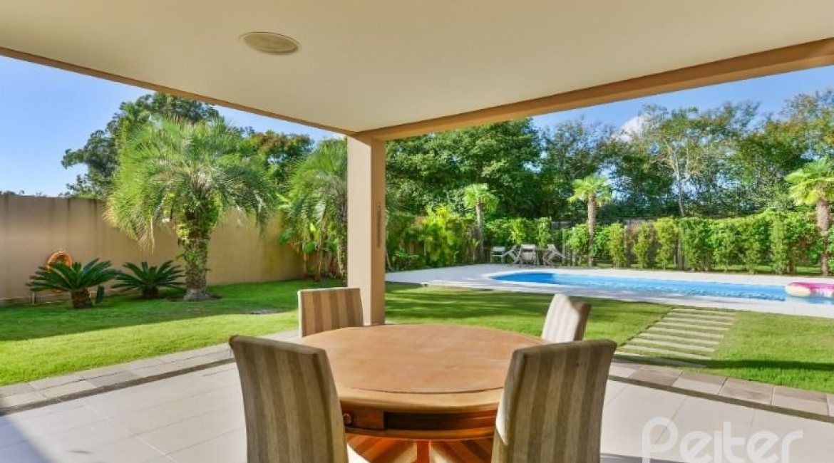 Casa em Condomínio à venda com 535m², 4 dormitórios, 4 suítes, 4 vagas, no bairro Terra Ville em PORTO ALEGRE