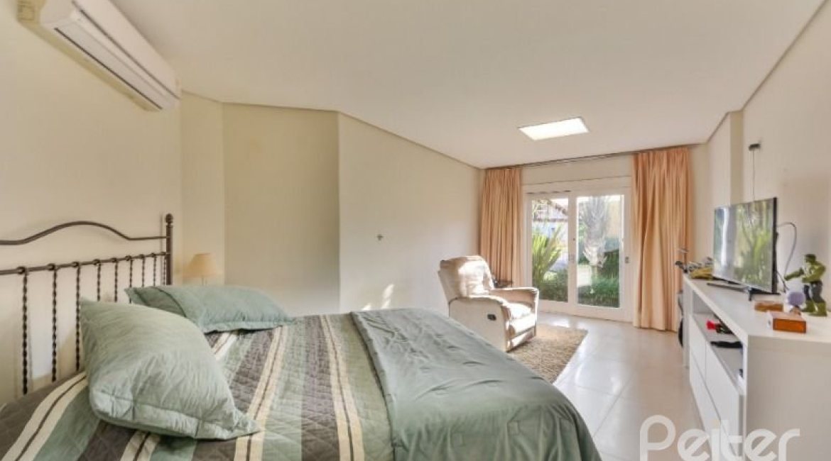 Casa em Condomínio à venda com 535m², 4 dormitórios, 4 suítes, 4 vagas, no bairro Terra Ville em PORTO ALEGRE