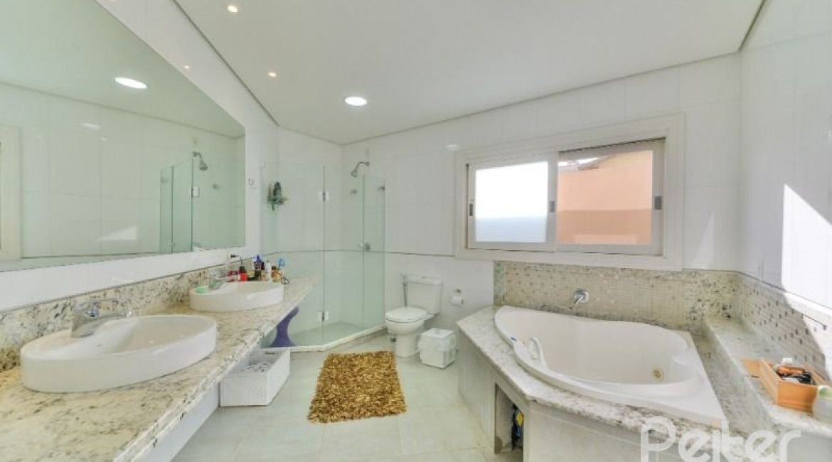 Casa em Condomínio à venda com 535m², 4 dormitórios, 4 suítes, 4 vagas, no bairro Terra Ville em PORTO ALEGRE