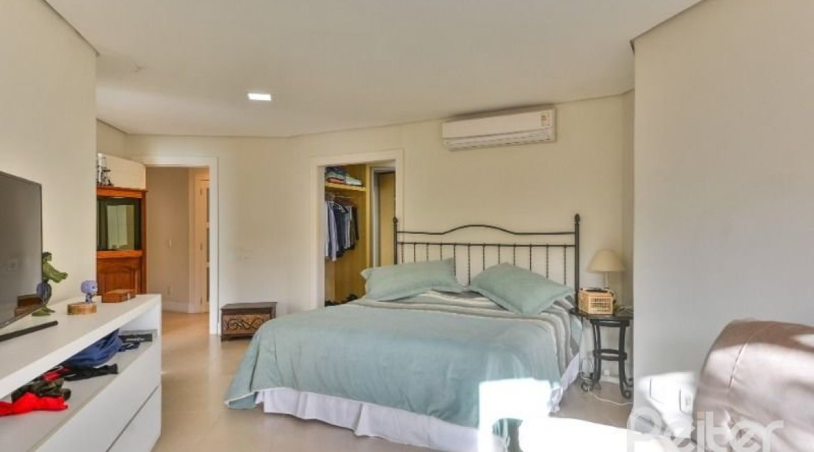 Casa em Condomínio à venda com 535m², 4 dormitórios, 4 suítes, 4 vagas, no bairro Terra Ville em PORTO ALEGRE