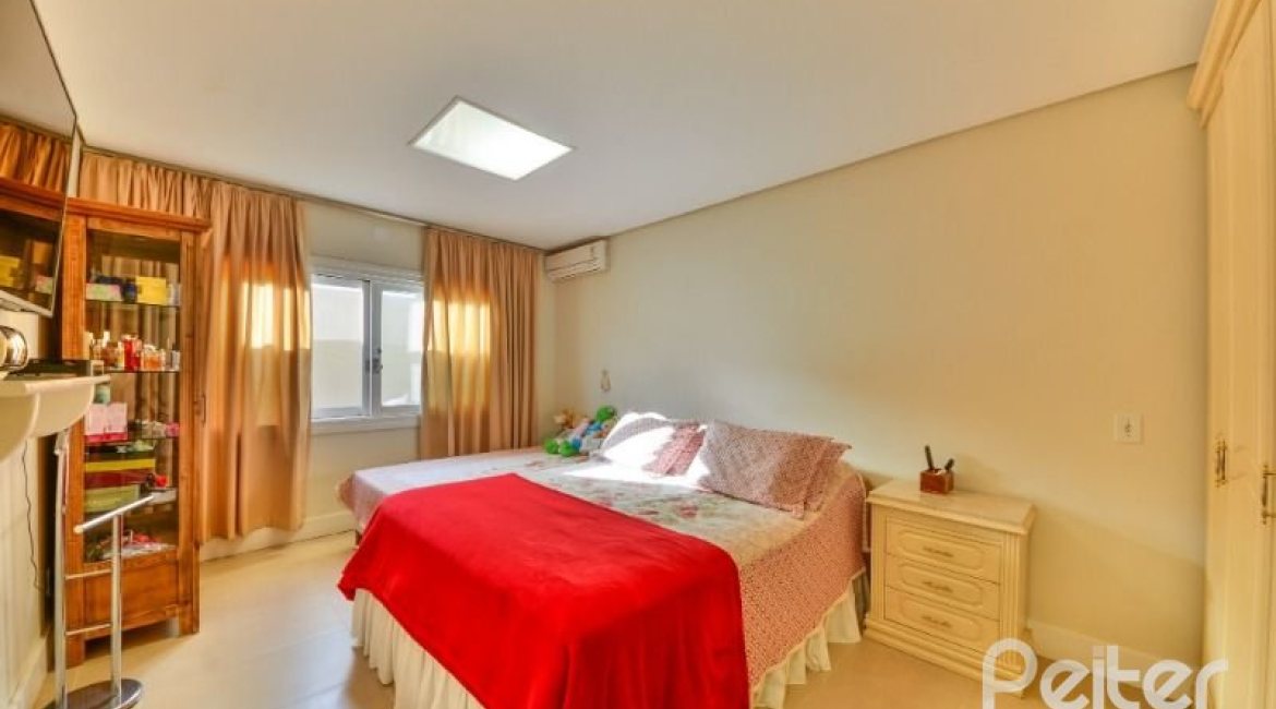 Casa em Condomínio à venda com 535m², 4 dormitórios, 4 suítes, 4 vagas, no bairro Terra Ville em PORTO ALEGRE