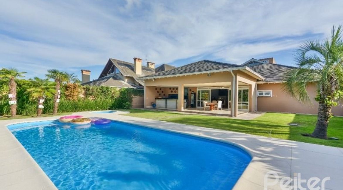 Casa em Condomínio à venda com 535m², 4 dormitórios, 4 suítes, 4 vagas, no bairro Terra Ville em PORTO ALEGRE