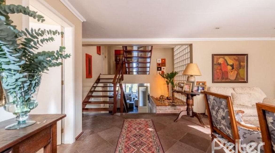 Casa à venda com 449m², 4 dormitórios, 4 suítes, 4 vagas, no bairro Jardim Isabel em Porto Alegre