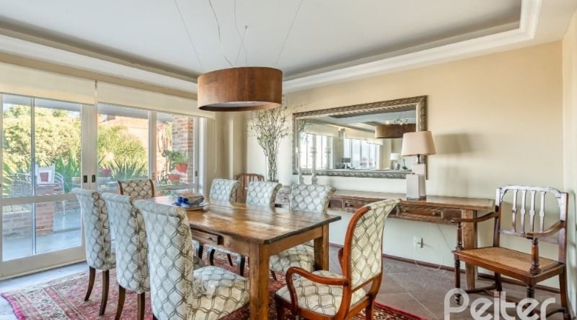 Casa à venda com 449m², 4 dormitórios, 4 suítes, 4 vagas, no bairro Jardim Isabel em Porto Alegre