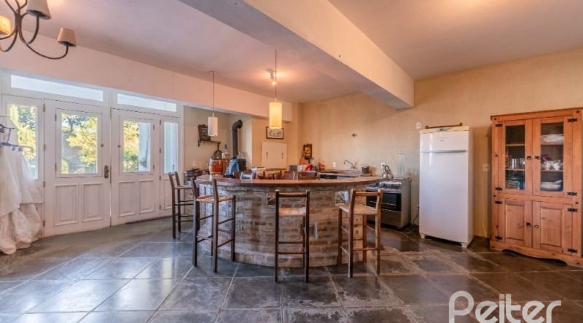 Casa à venda com 449m², 4 dormitórios, 4 suítes, 4 vagas, no bairro Jardim Isabel em Porto Alegre