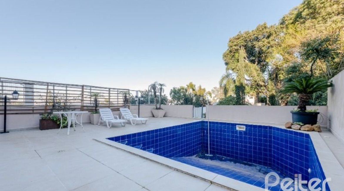 Casa à venda com 449m², 4 dormitórios, 4 suítes, 4 vagas, no bairro Jardim Isabel em Porto Alegre